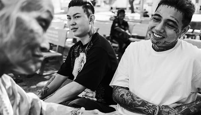 Two men with tattoos