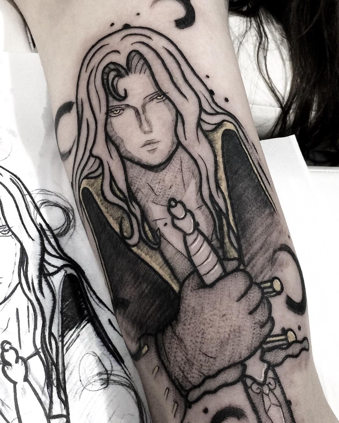 Black and white Alucard tattoo