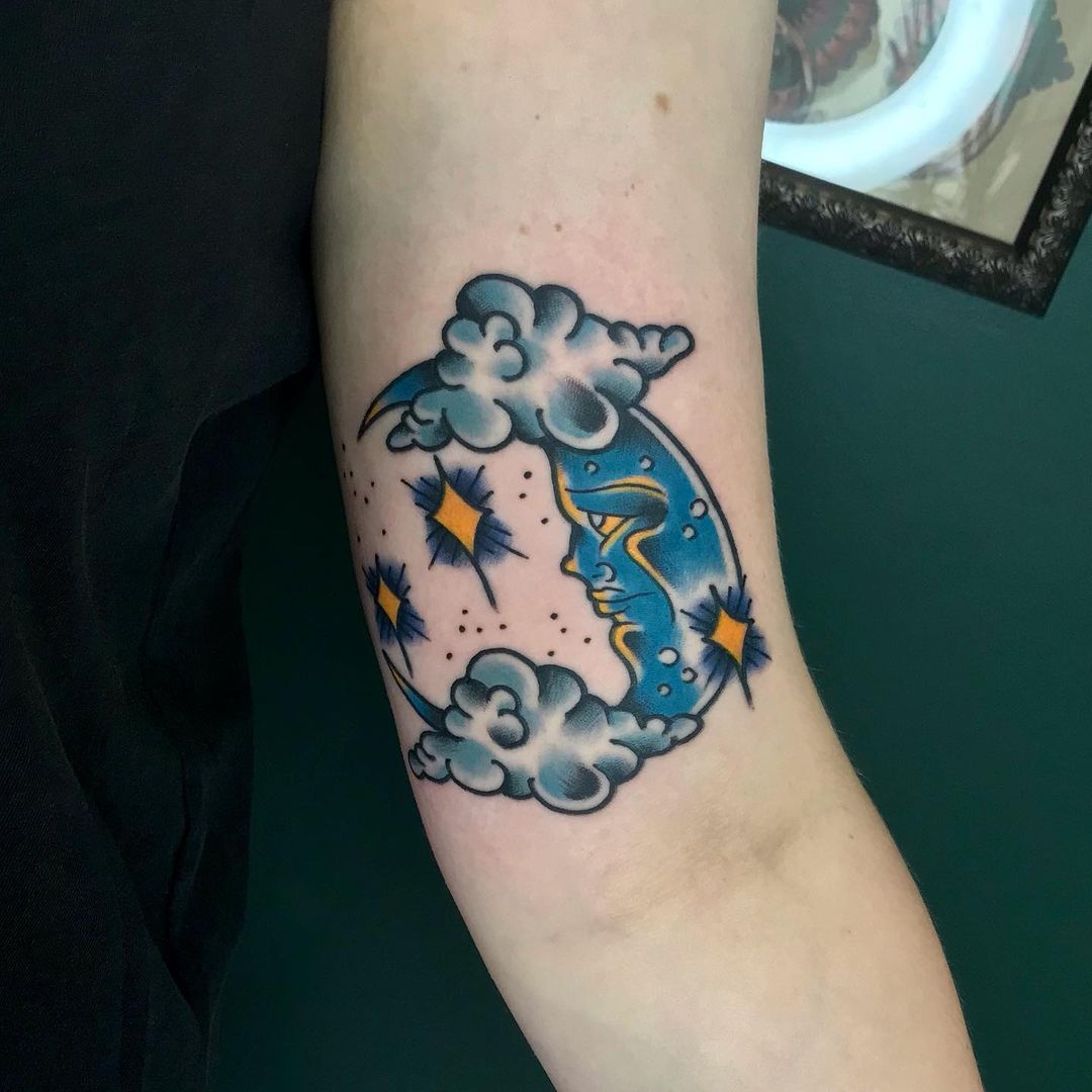 Colored traditional moon tattoo. (Source: @oldschool.mistress)