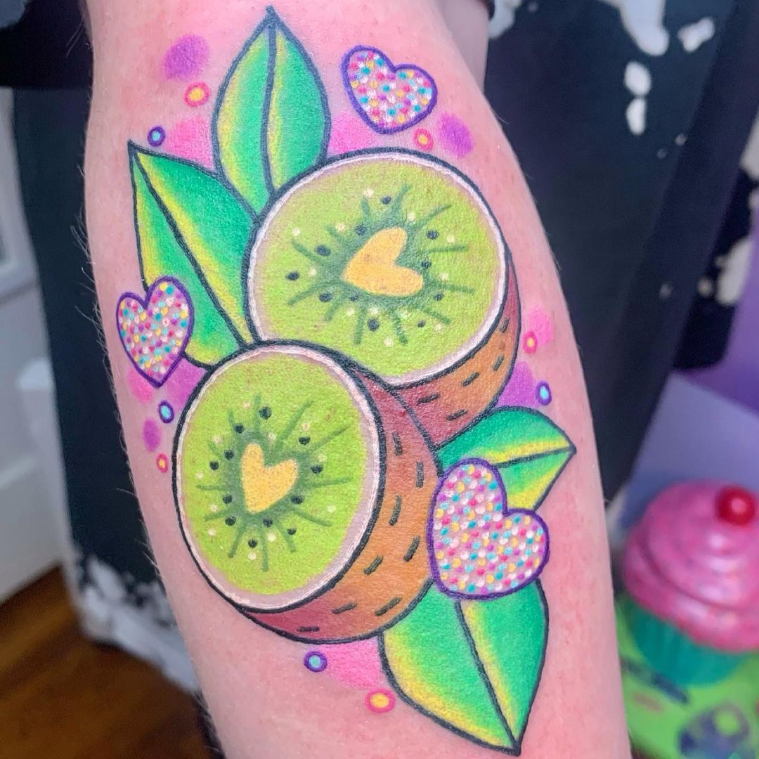 Cute and colourful kiwi fruit tattoo by @theartsyalien
