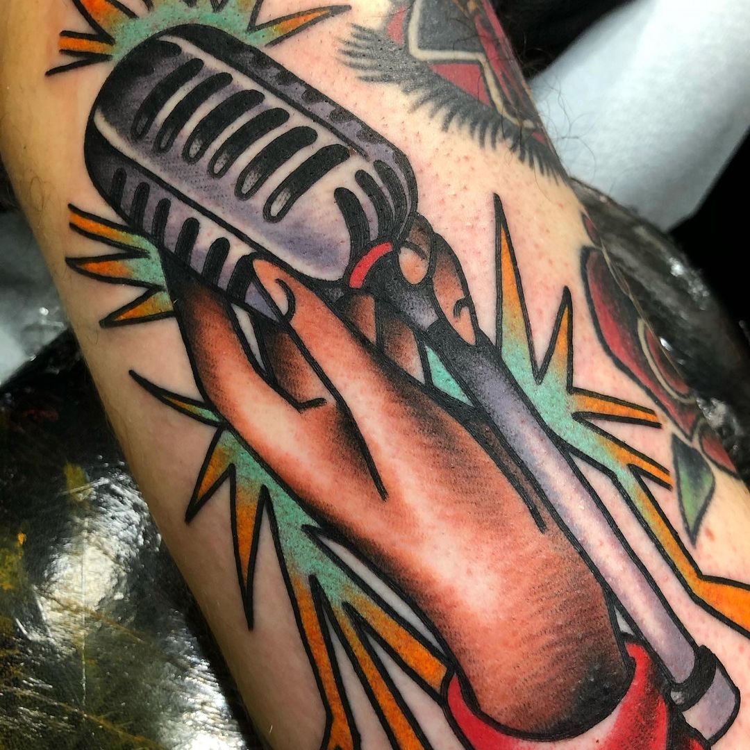 Traditional microphone tattoo by @ joemallardtattoos