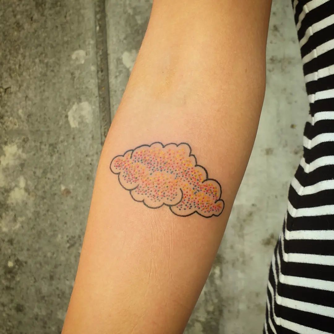 Colored sprinkles cloud tattoo.