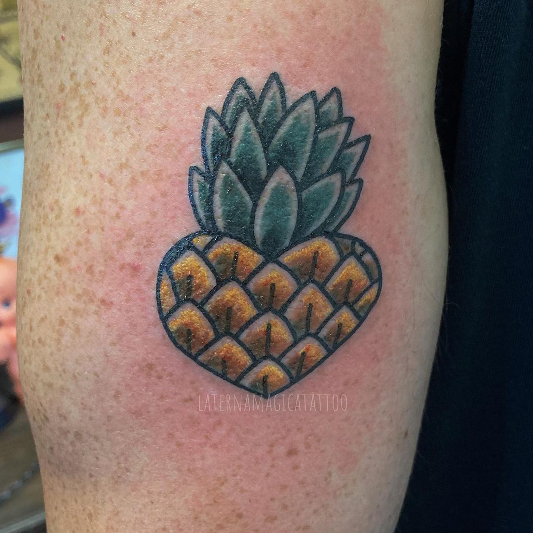 Heart shaped pineapple tattoo by @ulrichschildhauer