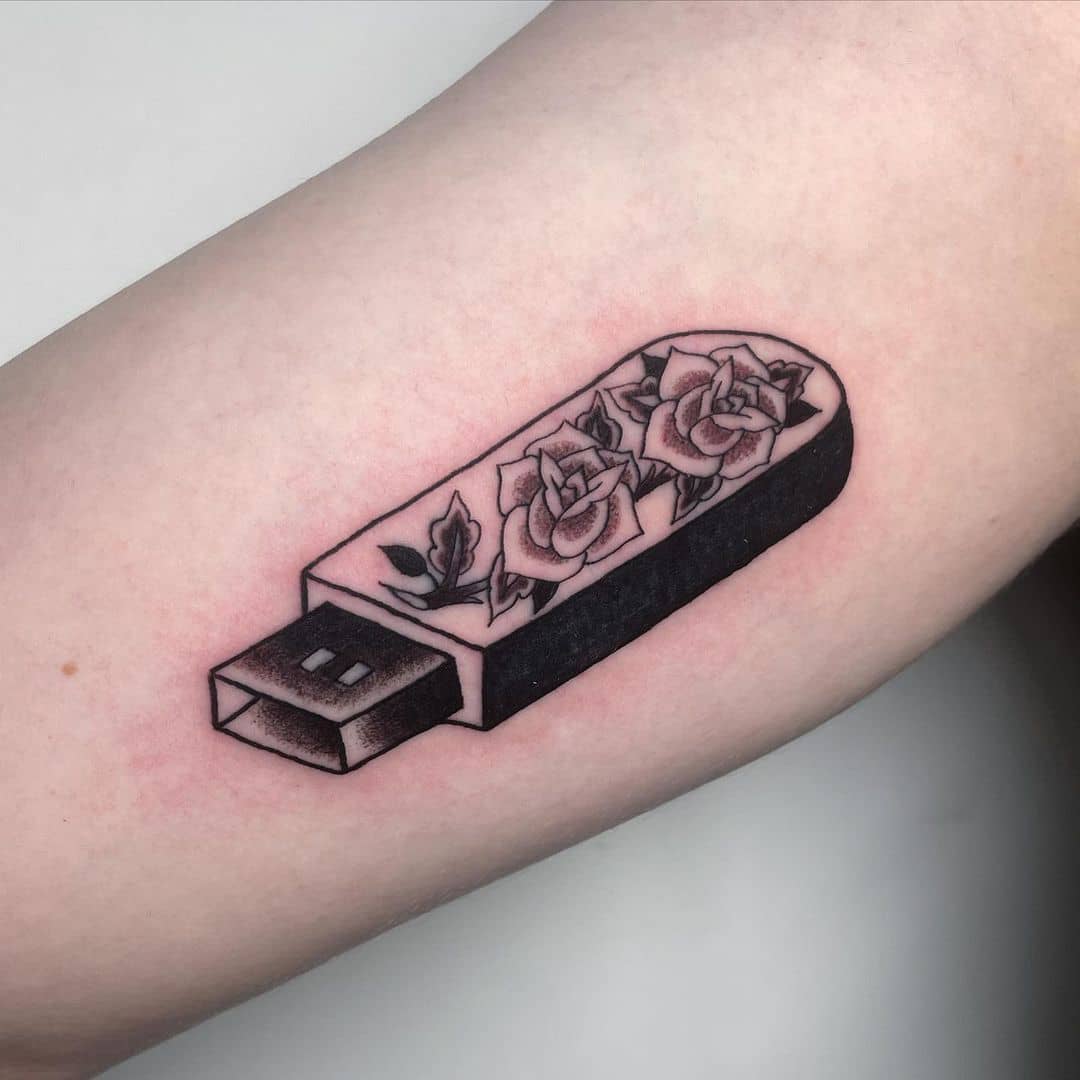 Floral USB tattoo.