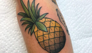 Colored pineapple tattoo by @smallstattooing