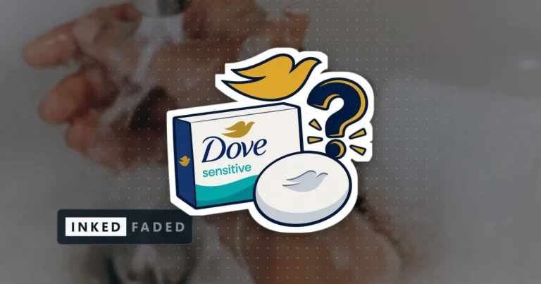 An illustrated carton and bar of Dove Sensitive soap with a gold dove mark and a question mark beside them, on a darkened photo of soapy hands being washed under a bathroom tap